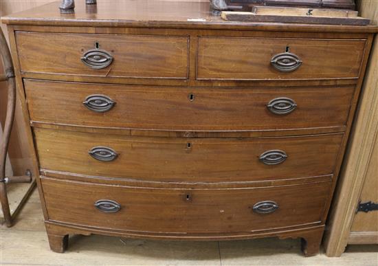 A late George III mahogany bowfront chest of drawers W.112cm